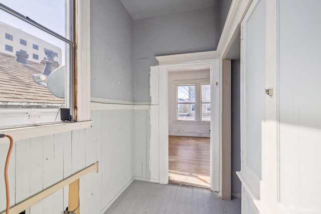 hall with light wood-style floors