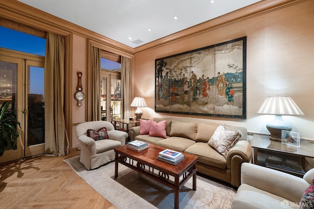 living room featuring ornamental molding, french doors, and light parquet floors