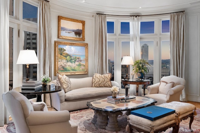 sitting room with ornamental molding