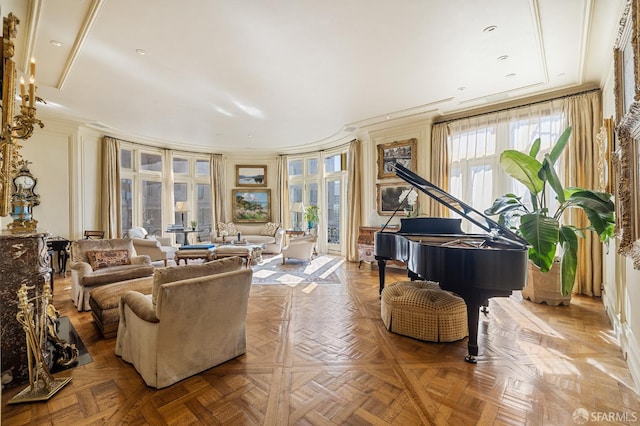 living area with parquet floors, crown molding, and french doors