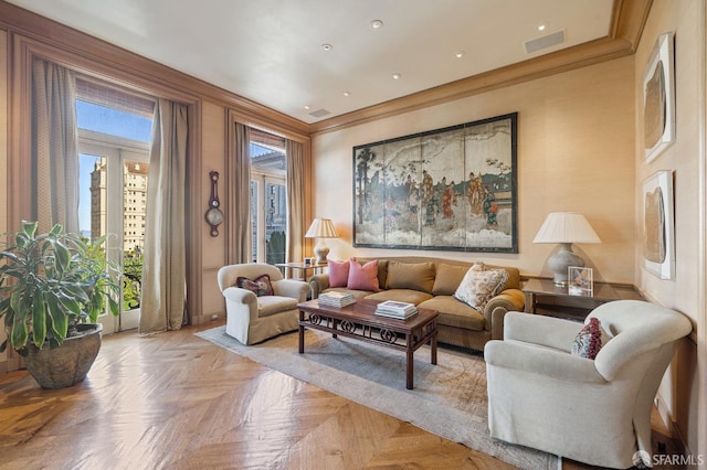 living room featuring light parquet floors and crown molding