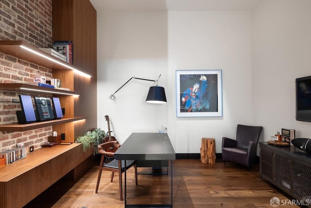 706 Mission St Unit 1001, San Francisco, CA 94103 - office area with wood finished floors and brick wall