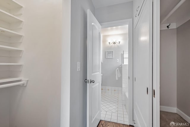 bathroom featuring baseboards