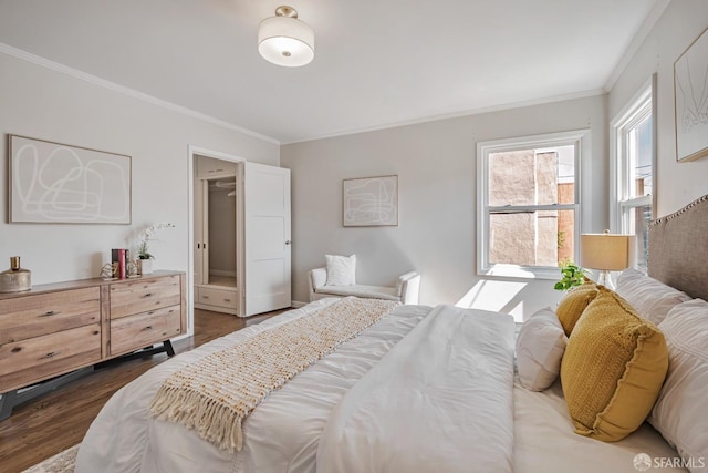 bedroom featuring crown molding and dark wood-type flooring
