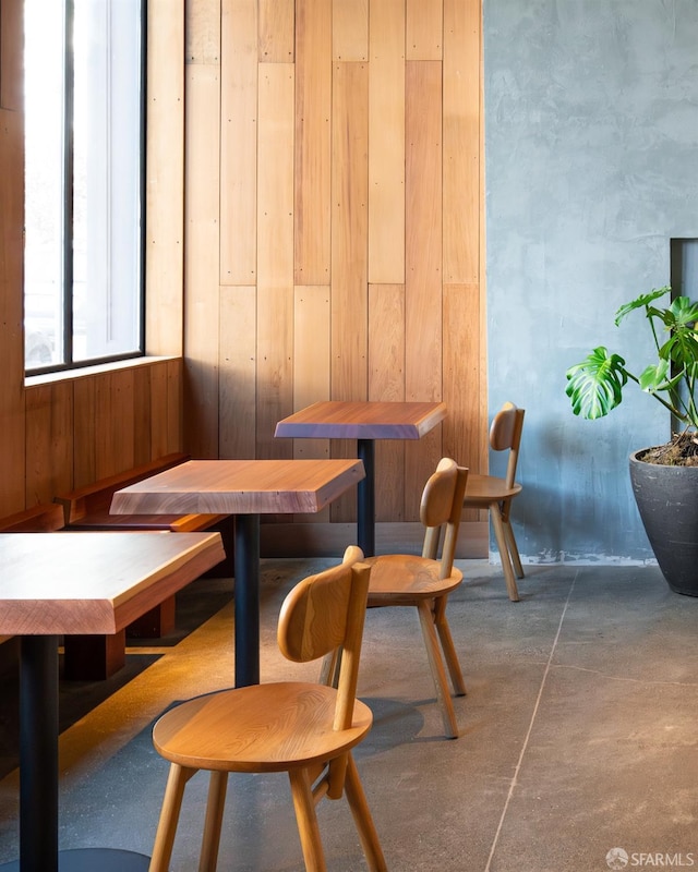 dining room featuring concrete floors