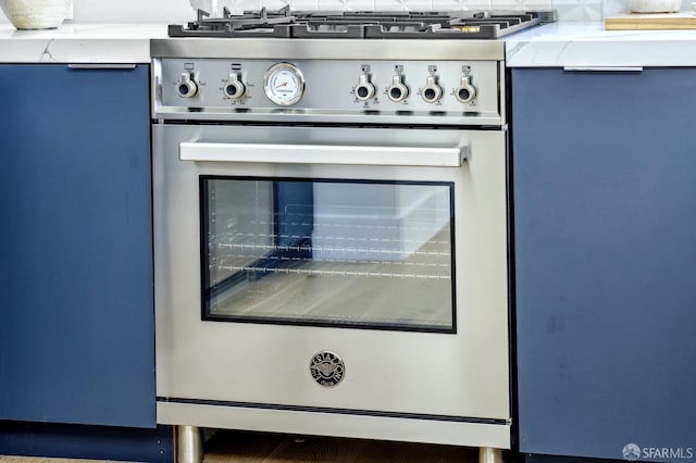 interior details with stainless steel range oven