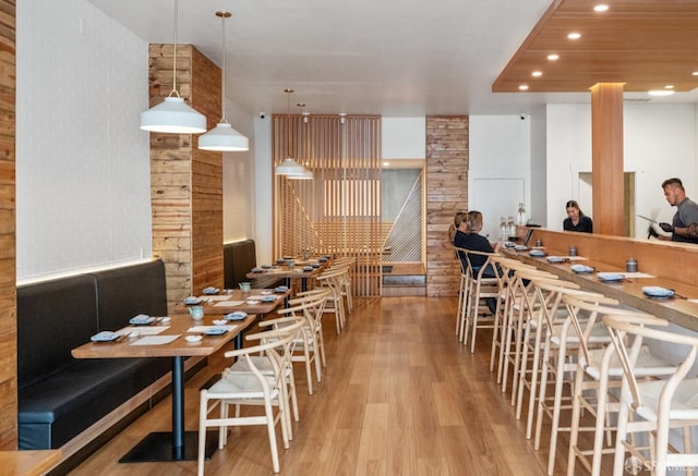 dining area with light hardwood / wood-style floors