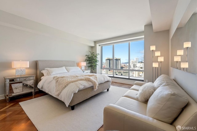 bedroom featuring a city view