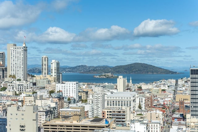 view of city with a water and mountain view