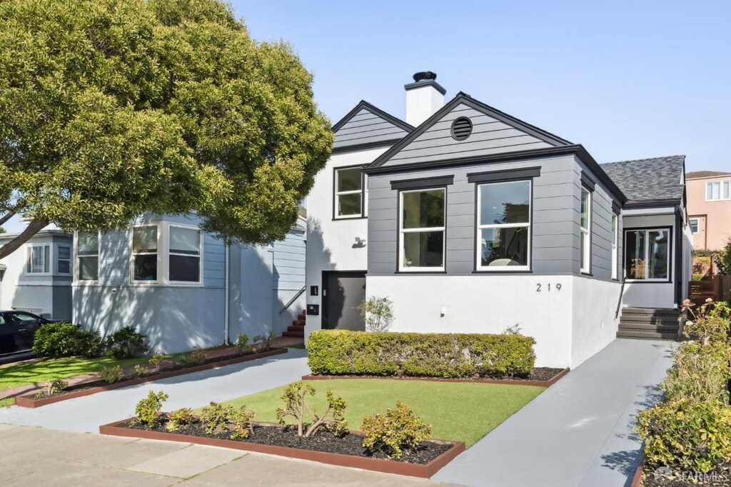 219 Denslowe Dr, San Francisco, CA 94132 - view of front of property with a chimney and stucco siding