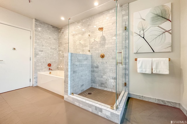 bathroom with independent shower and bath