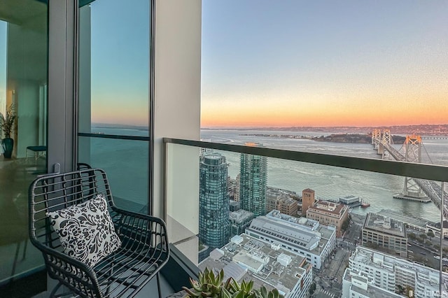 balcony at dusk with a water view