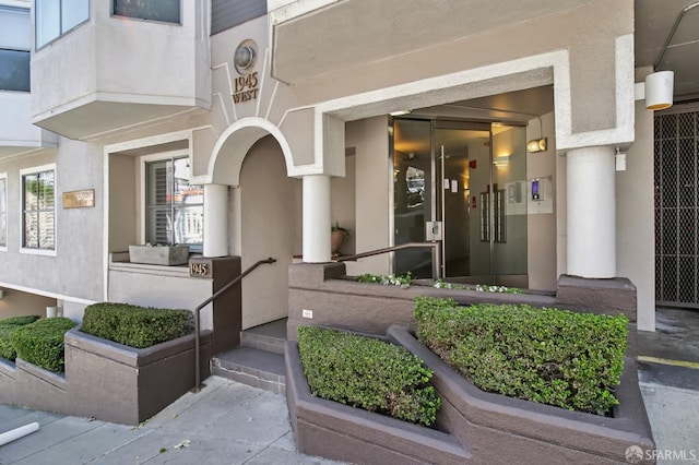 1945 Washington St Unit 412, San Francisco, CA 94109 - property entrance with stucco siding and elevator