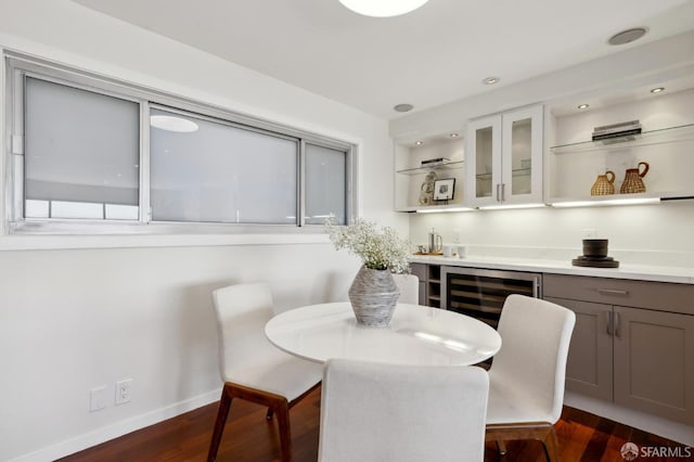 11 Perego Ter Unit 6, San Francisco, CA 94131 - dining area featuring dark wood-type flooring, baseboards, bar area, and beverage cooler