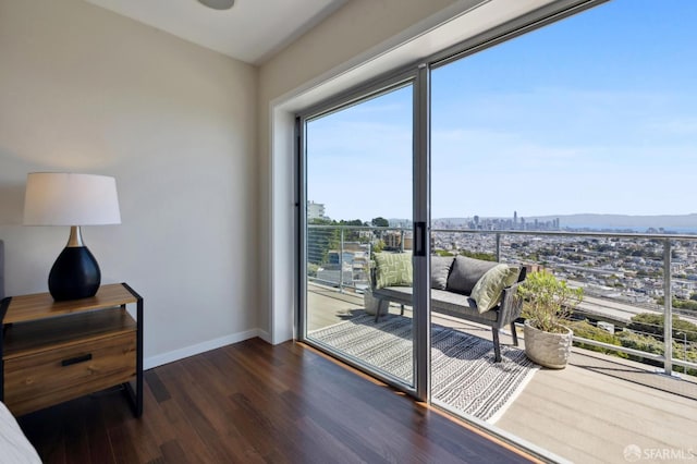 11 Perego Ter Unit 6, San Francisco, CA 94131 - living area with dark wood-type flooring, baseboards, and a view of city