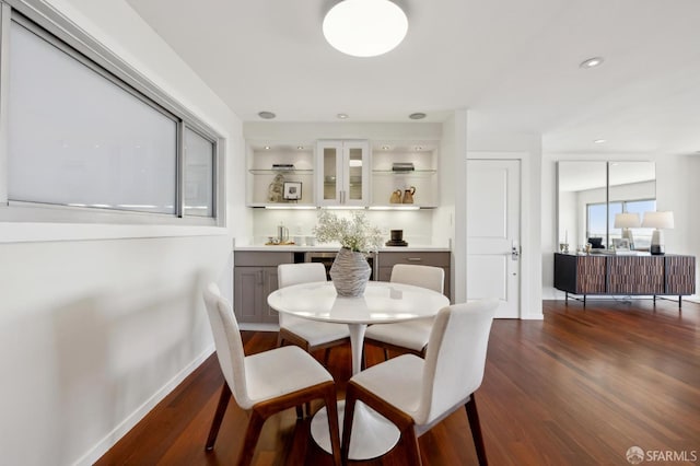 11 Perego Ter Unit 6, San Francisco, CA 94131 - dining room with dark wood-style floors, baseboards, bar area, and recessed lighting