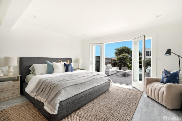 1643 43rd Ave, San Francisco, CA 94122 - bedroom with access to outside and light wood-style flooring