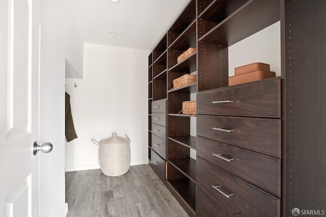 1643 43rd Ave, San Francisco, CA 94122 - spacious closet featuring wood finished floors