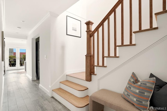 1643 43rd Ave, San Francisco, CA 94122 - stairs featuring ornamental molding, wood finished floors, and french doors