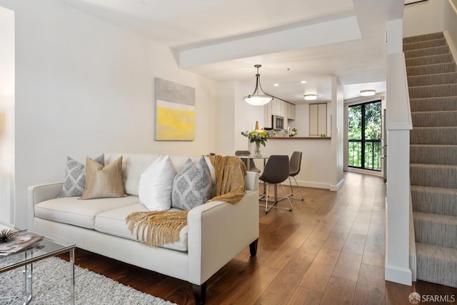 601 Van Ness Ave Unit 35, San Francisco, CA 94102 - living room featuring stairway and hardwood / wood-style flooring