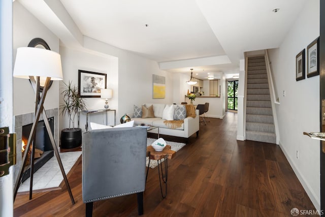 601 Van Ness Ave Unit 35, San Francisco, CA 94102 - living area with stairs and dark wood-style floors