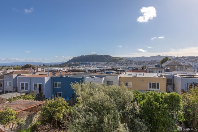 property view of mountains featuring a residential view