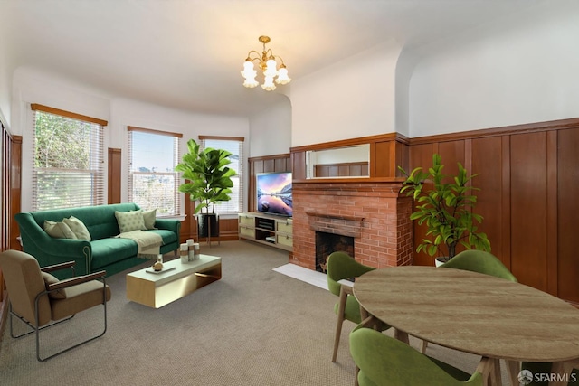 317 Douglass St, San Francisco, CA 94114 - living room featuring a brick fireplace, light colored carpet, and a chandelier