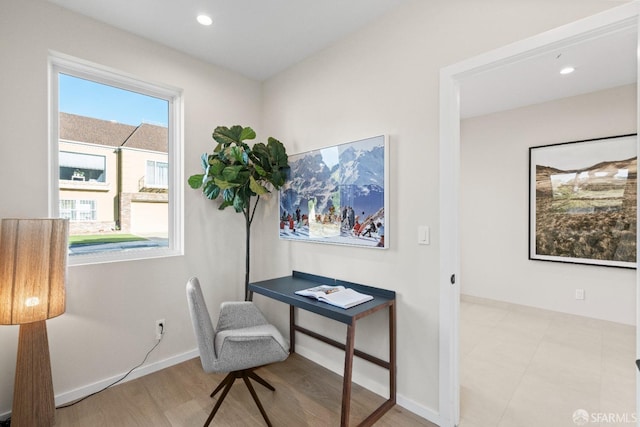 office space with baseboards, wood finished floors, and recessed lighting