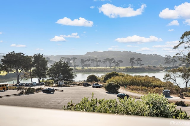 mountain view featuring a nearby body of water