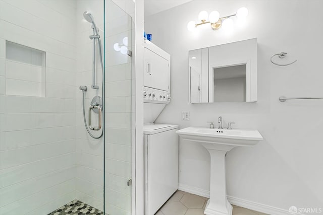 3870 18th St, San Francisco, CA 94114 - bathroom with stacked washing machine and dryer, tiled shower, tile patterned floors, and a sink
