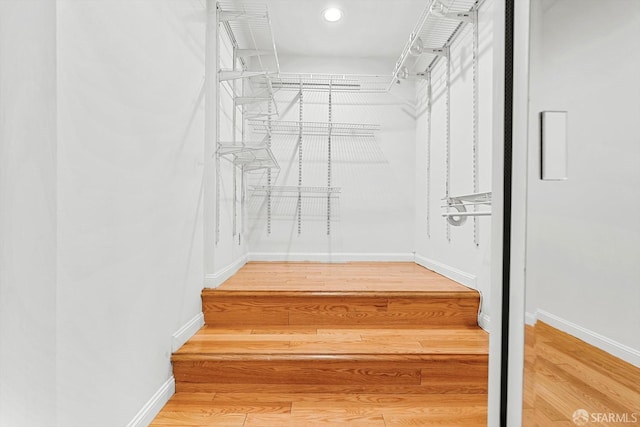 3870 18th St, San Francisco, CA 94114 - walk in closet featuring wood finished floors