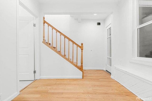 3870 18th St, San Francisco, CA 94114 - foyer featuring light wood finished floors, stairway, baseboards, and recessed lighting