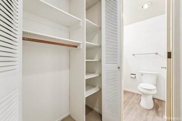95 Ora Way Unit 303F, San Francisco, CA 94131 - bathroom featuring a closet and wood finished floors