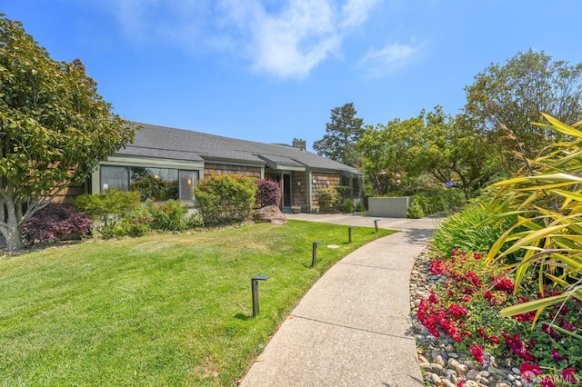 95 Ora Way Unit 303F, San Francisco, CA 94131 - view of front of home with a front yard and a chimney