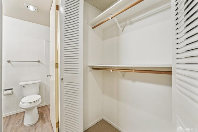 95 Ora Way Unit 303F, San Francisco, CA 94131 - bathroom with a closet and wood finished floors