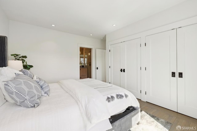 3226 Octavia St, San Francisco, CA 94123 - bedroom featuring two closets, wood finished floors, recessed lighting, and ensuite bath