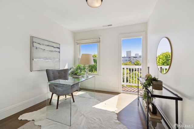 3226 Octavia St, San Francisco, CA 94123 - office space featuring wood finished floors, baseboards, and a view of city