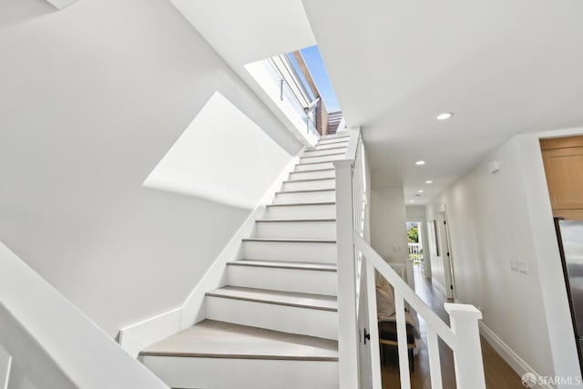 3226 Octavia St, San Francisco, CA 94123 - stairs featuring recessed lighting, baseboards, and wood finished floors