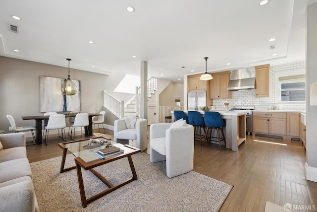 3226 Octavia St, San Francisco, CA 94123 - living room featuring light wood-style floors, stairs, and recessed lighting