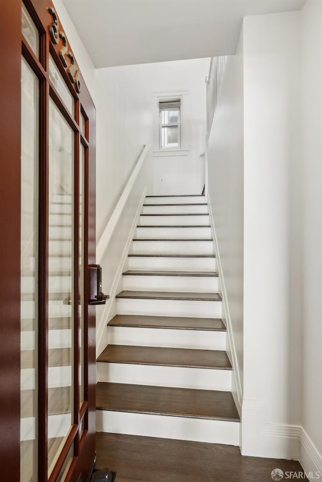 3226 Octavia St, San Francisco, CA 94123 - staircase featuring wood finished floors