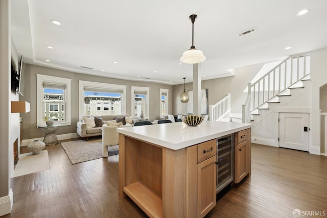 3226 Octavia St, San Francisco, CA 94123 - kitchen featuring wine cooler, recessed lighting, dark wood-type flooring, pendant lighting, and light countertops