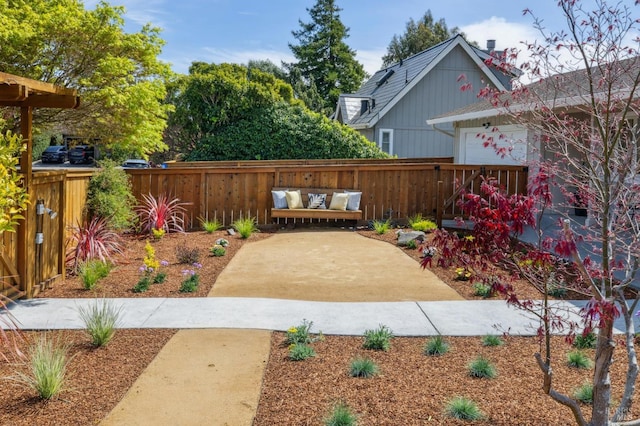 view of yard featuring a patio and fence