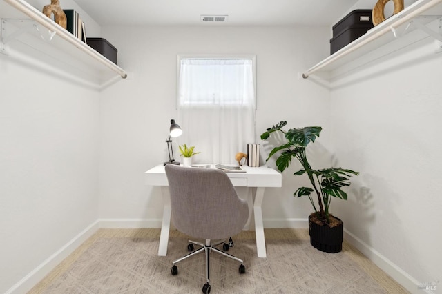 office with visible vents and baseboards