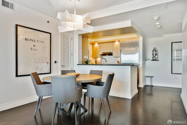 229 Brannan St Unit 12C, San Francisco, CA 94107 - dining room with dark wood finished floors and baseboards
