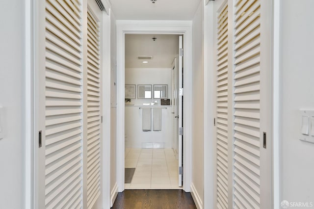 229 Brannan St Unit 12C, San Francisco, CA 94107 - hallway with dark tile patterned flooring