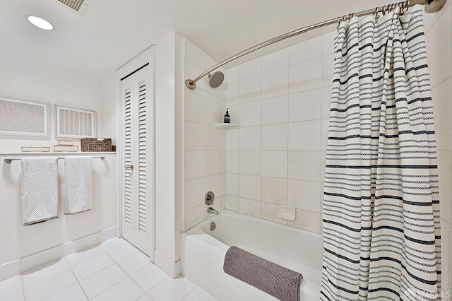 229 Brannan St Unit 12C, San Francisco, CA 94107 - bathroom with shower / bath combination with curtain, tile patterned flooring, and recessed lighting