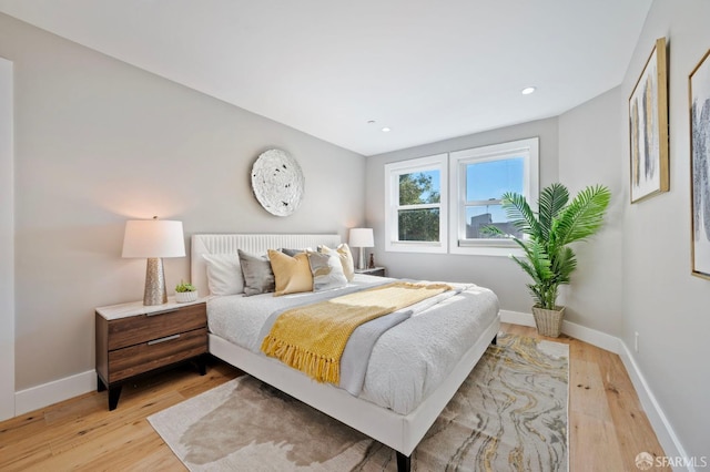 bedroom featuring light hardwood / wood-style floors