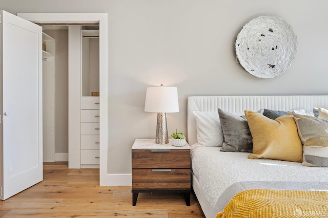 bedroom with light hardwood / wood-style floors