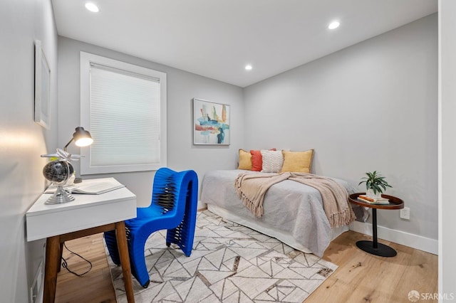 bedroom featuring light hardwood / wood-style floors