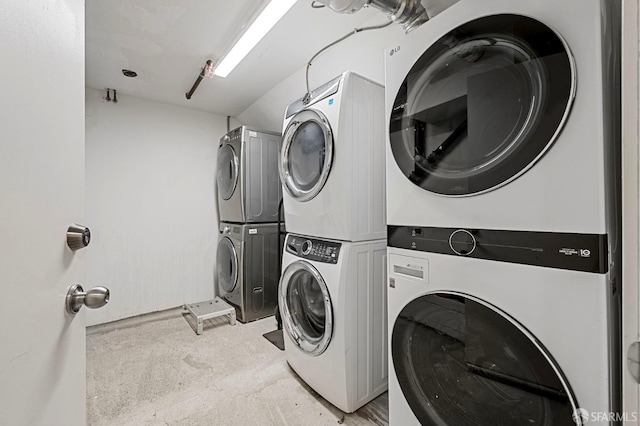 washroom with stacked washer / dryer